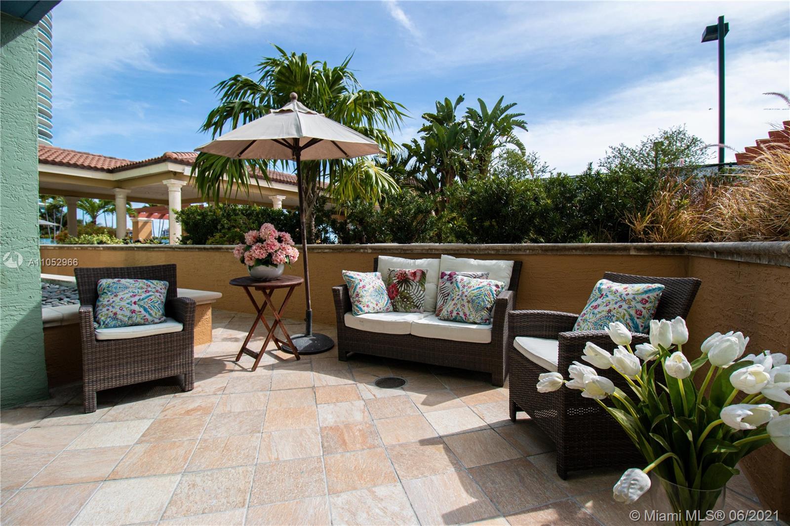 90 Alton Road, Unit 608 Miami Beach, FL 33139 - Photo 1 of 21 a view of a terrace with sitting area