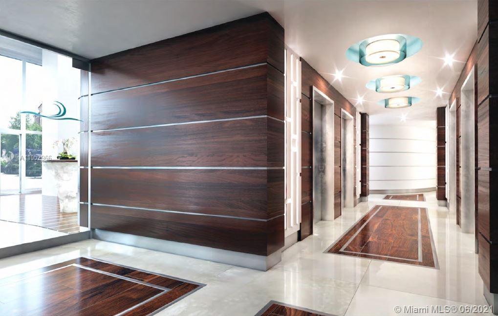 90 Alton Road, Unit 608 Miami Beach, FL 33139 - Photo 16 of 21 a room with window and a rug