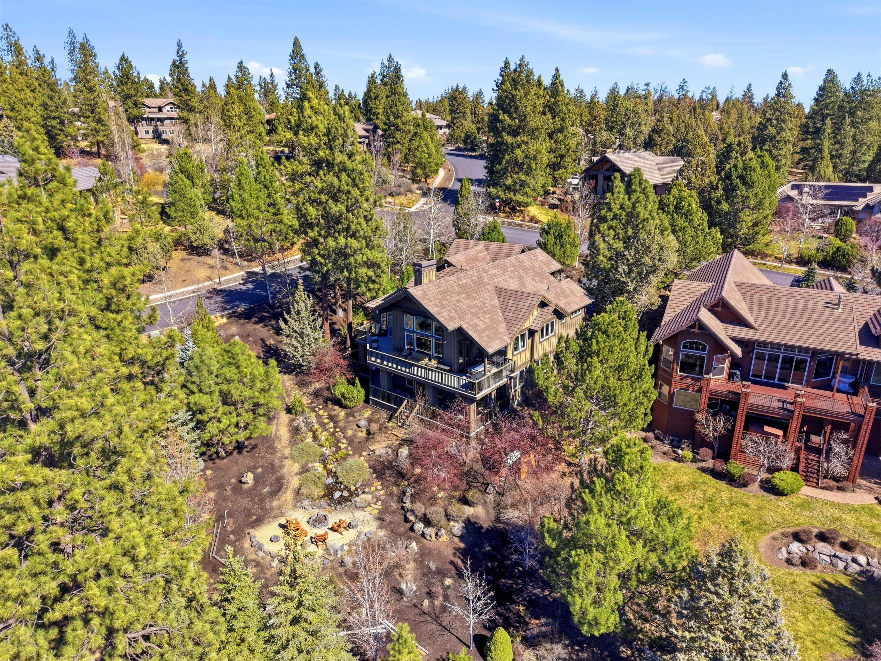 15 Southwest Quail Butte Place Bend, OR 97703 - Photo 51 of 55 an aerial view of a house with a garden