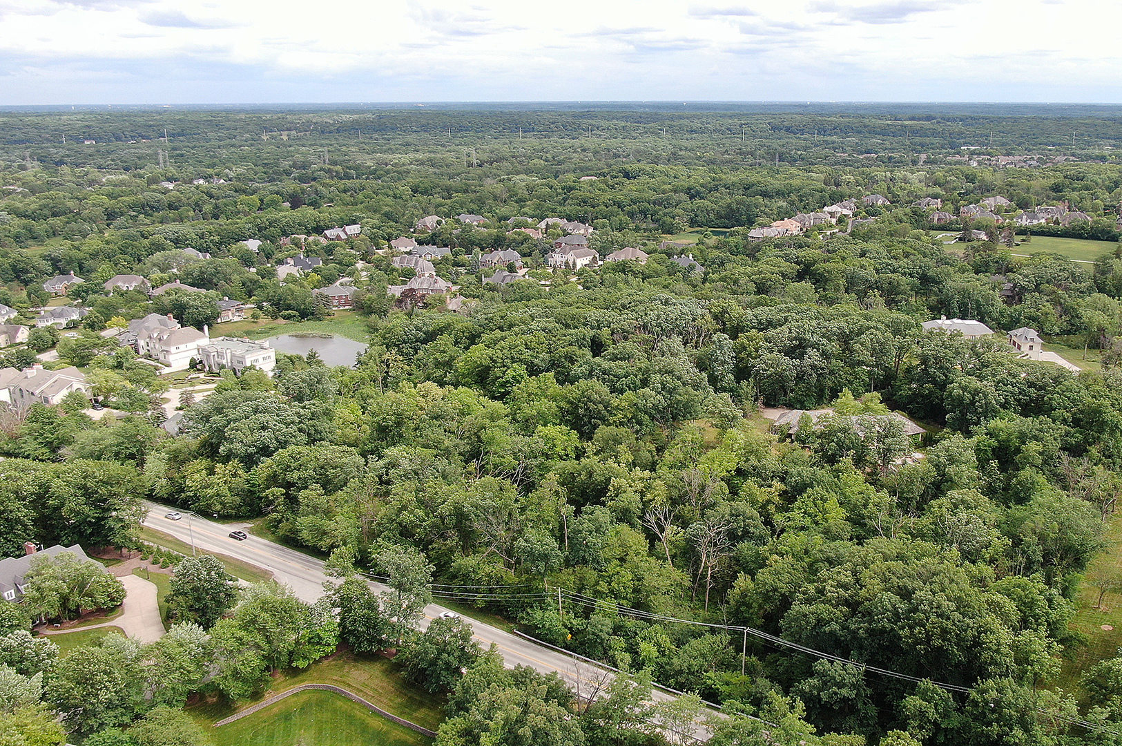 11700 German Church Road Burr Ridge, IL 60527 - Photo 11 of 13 an aerial view of residential houses with outdoor space and trees