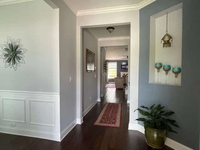 a view of hallway with livingroom and hallway