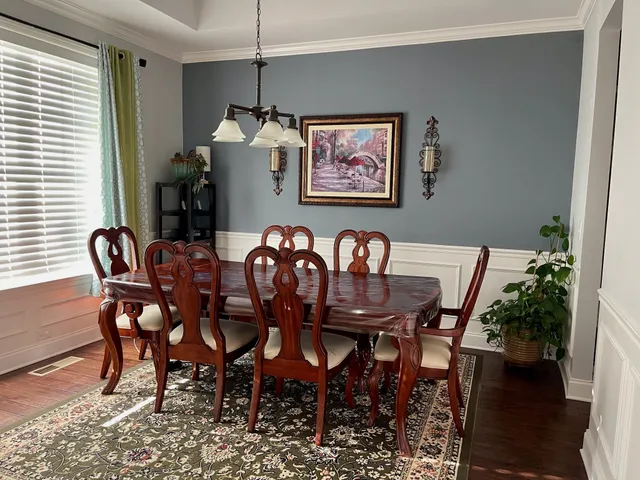 a view of a dining room with furniture
