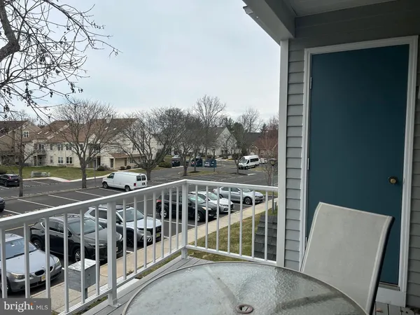 a balcony with trees