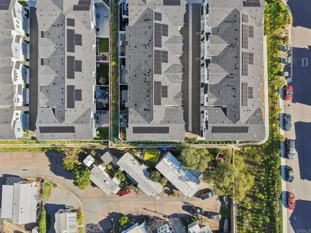 front view of a bathroom with a tub and shower