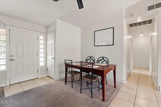 a view of a livingroom with furniture and windows