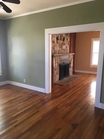 a view of a livingroom with a fireplace
