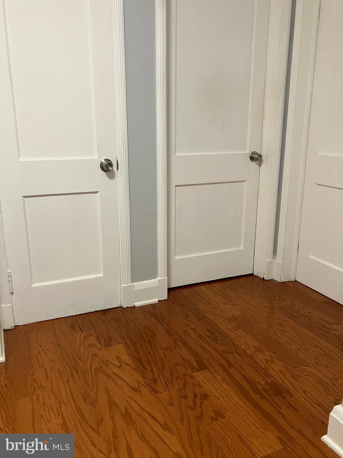 5111 Underwood Road Baltimore, MD 21212 - Photo 11 of 20 a view of an empty room with wooden floor