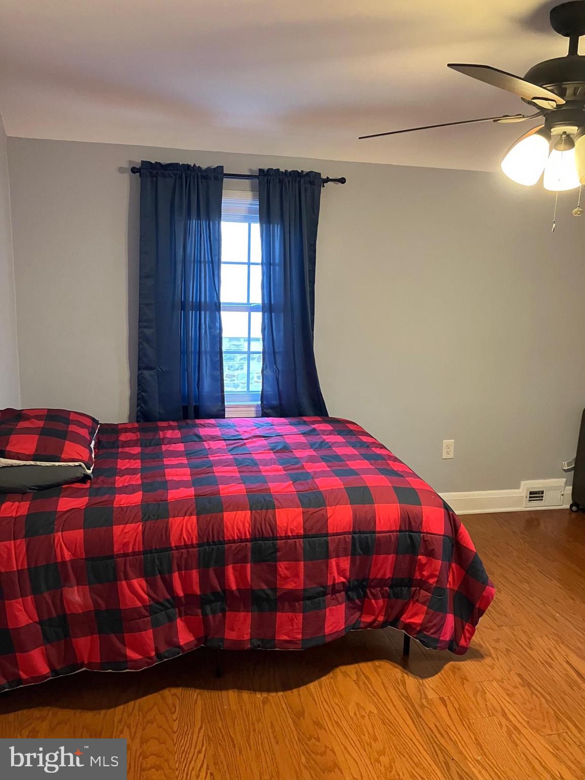 5111 Underwood Road Baltimore, MD 21212 - Photo 13 of 20 a bedroom with a bed and window