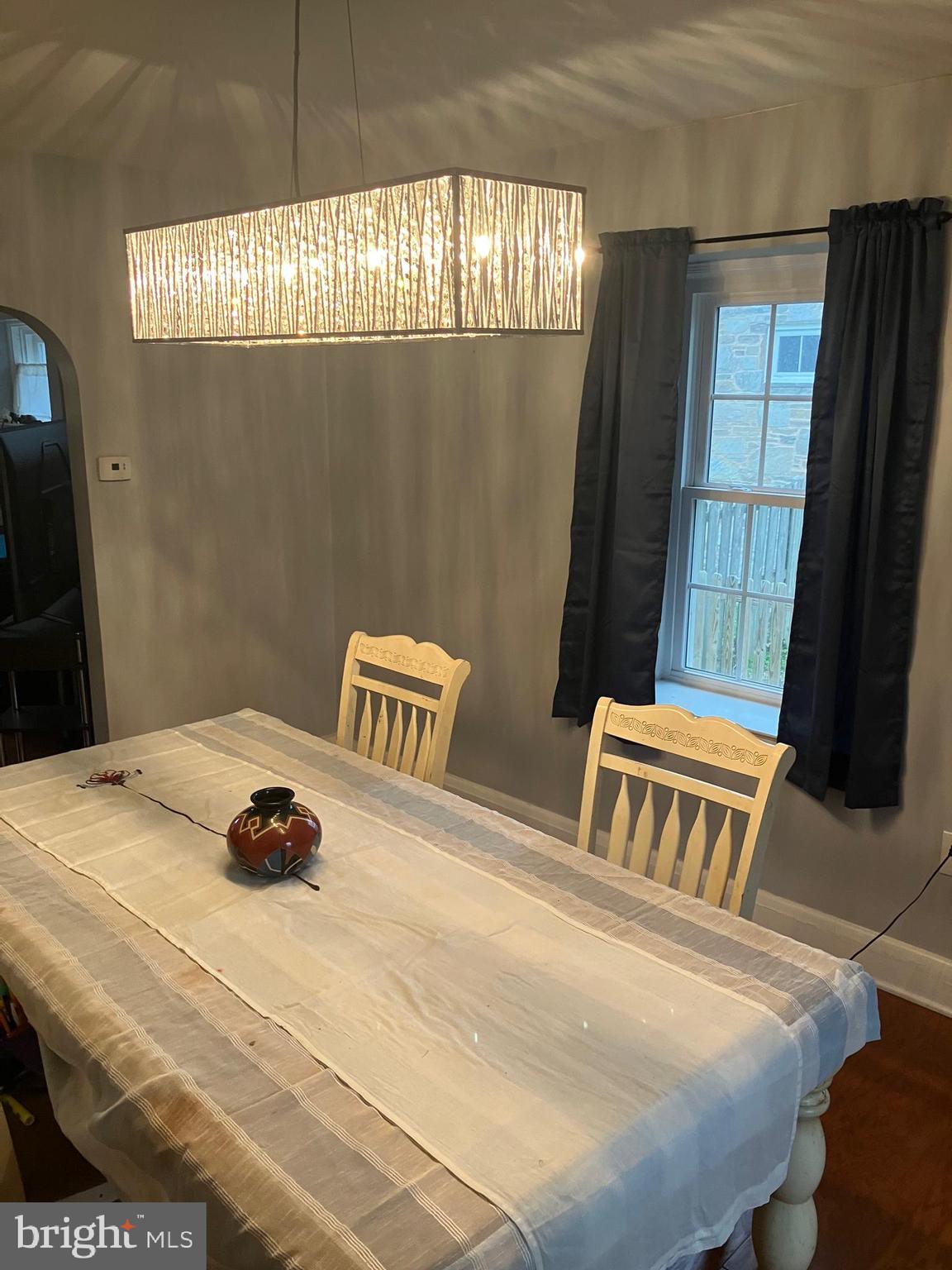 5111 Underwood Road Baltimore, MD 21212 - Photo 5 of 20 a bedroom with a bed and a window