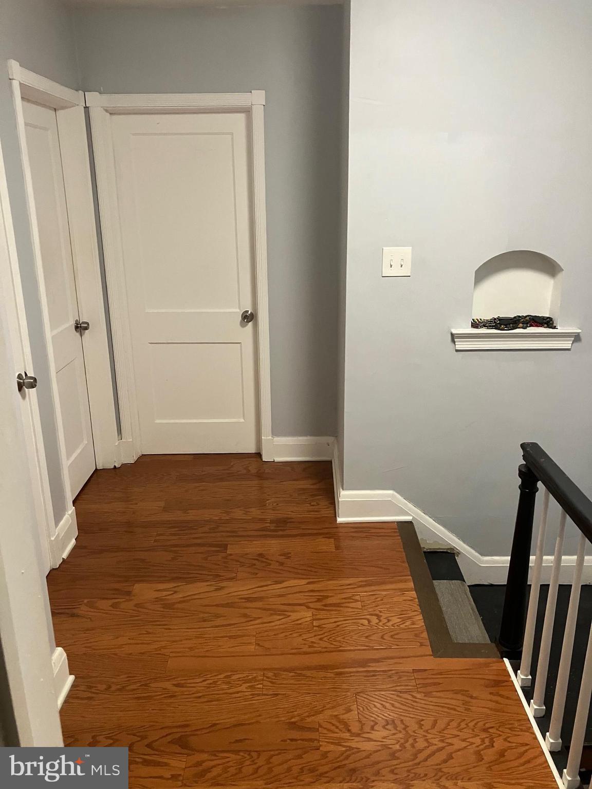 5111 Underwood Road Baltimore, MD 21212 - Photo 10 of 20 a view of a room with wooden floor and white walls