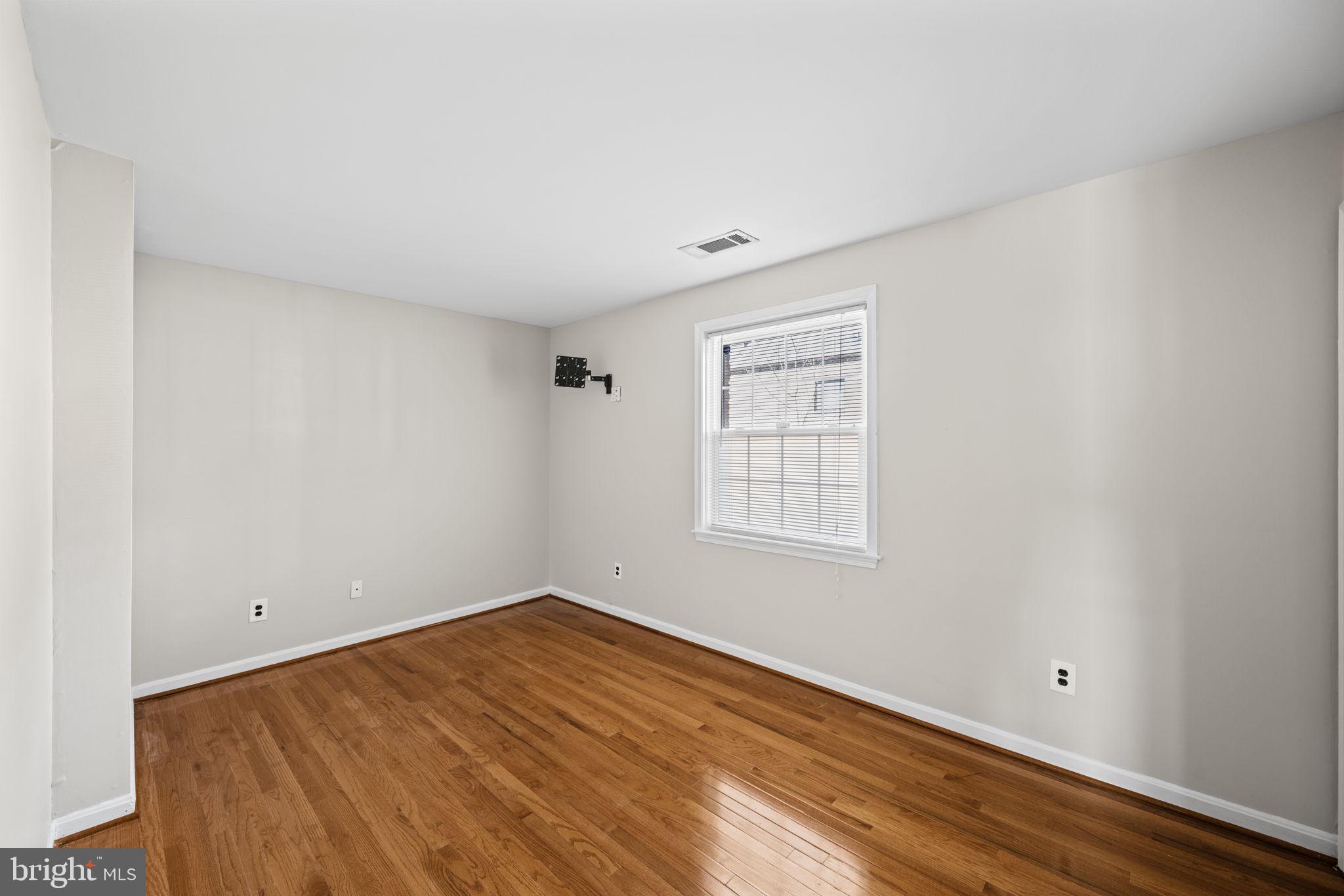2001 Fort Davis Street Southeast, Unit 102 Washington, DC 20020 - Photo 14 of 30 an empty room with a window