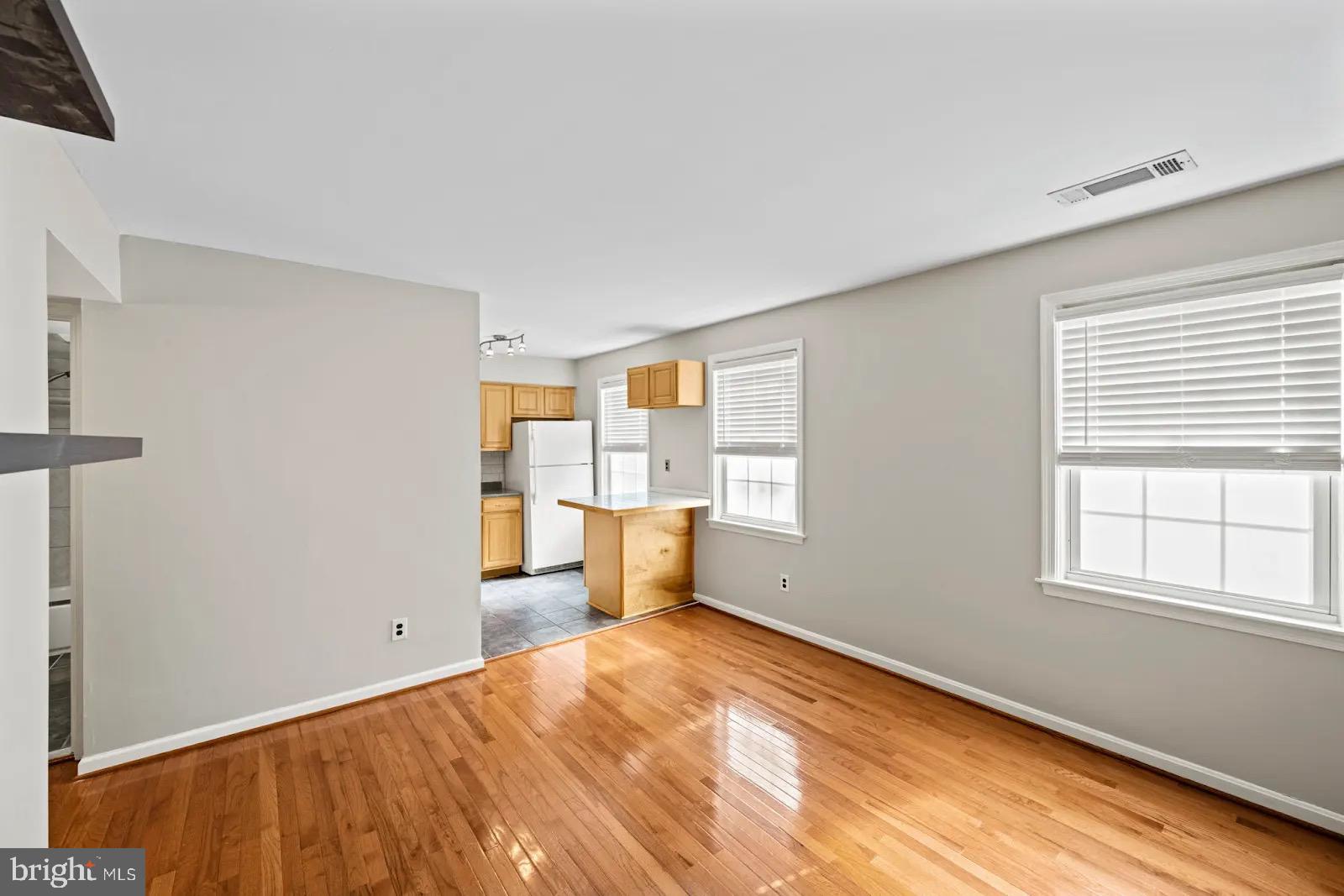 2001 Fort Davis Street Southeast, Unit 102 Washington, DC 20020 - Photo 10 of 30 a bedroom with a bed and window