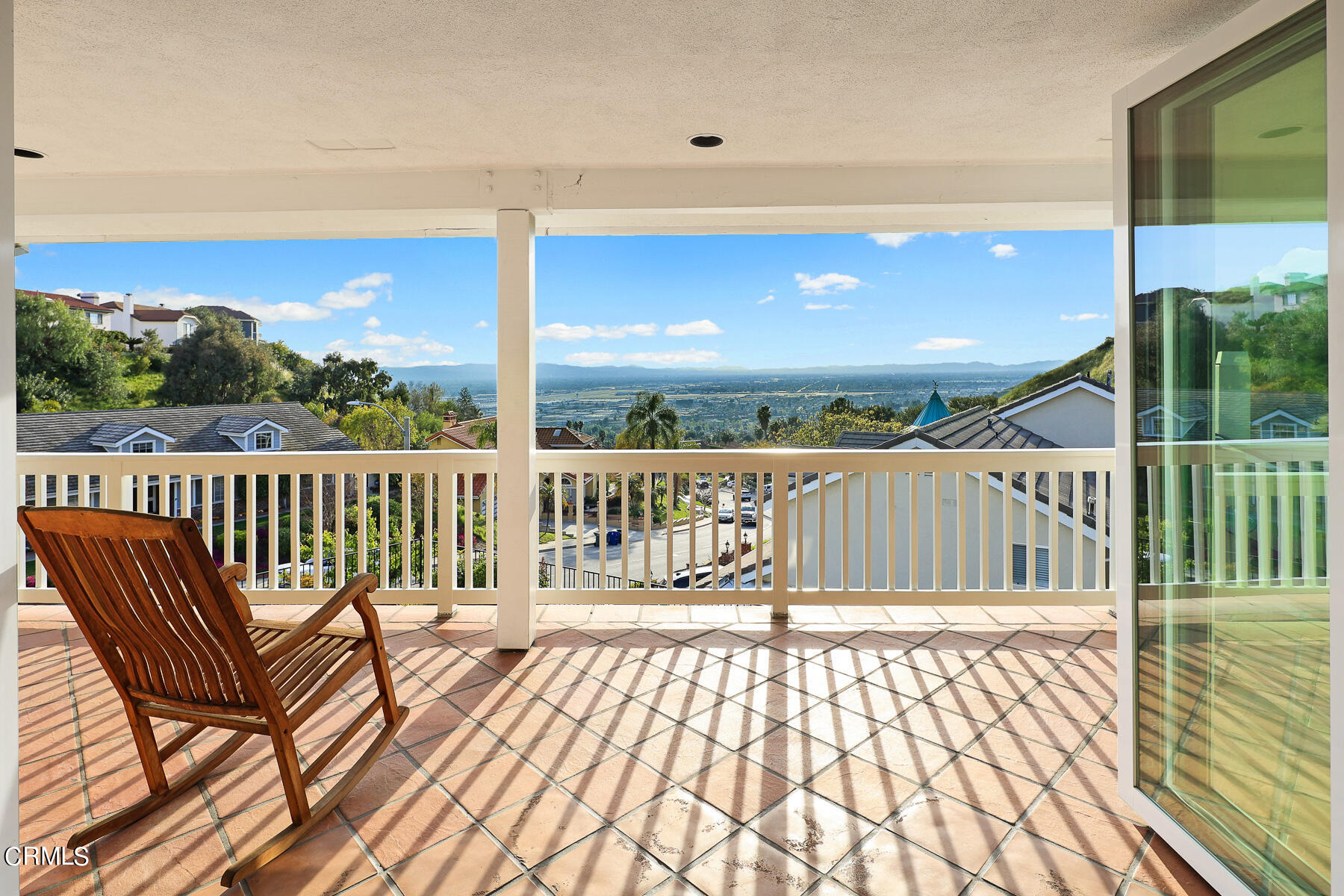 3337 Haven Way Burbank, CA 91504 - Photo 15 of 63 a balcony with view of dining room and wooden floor