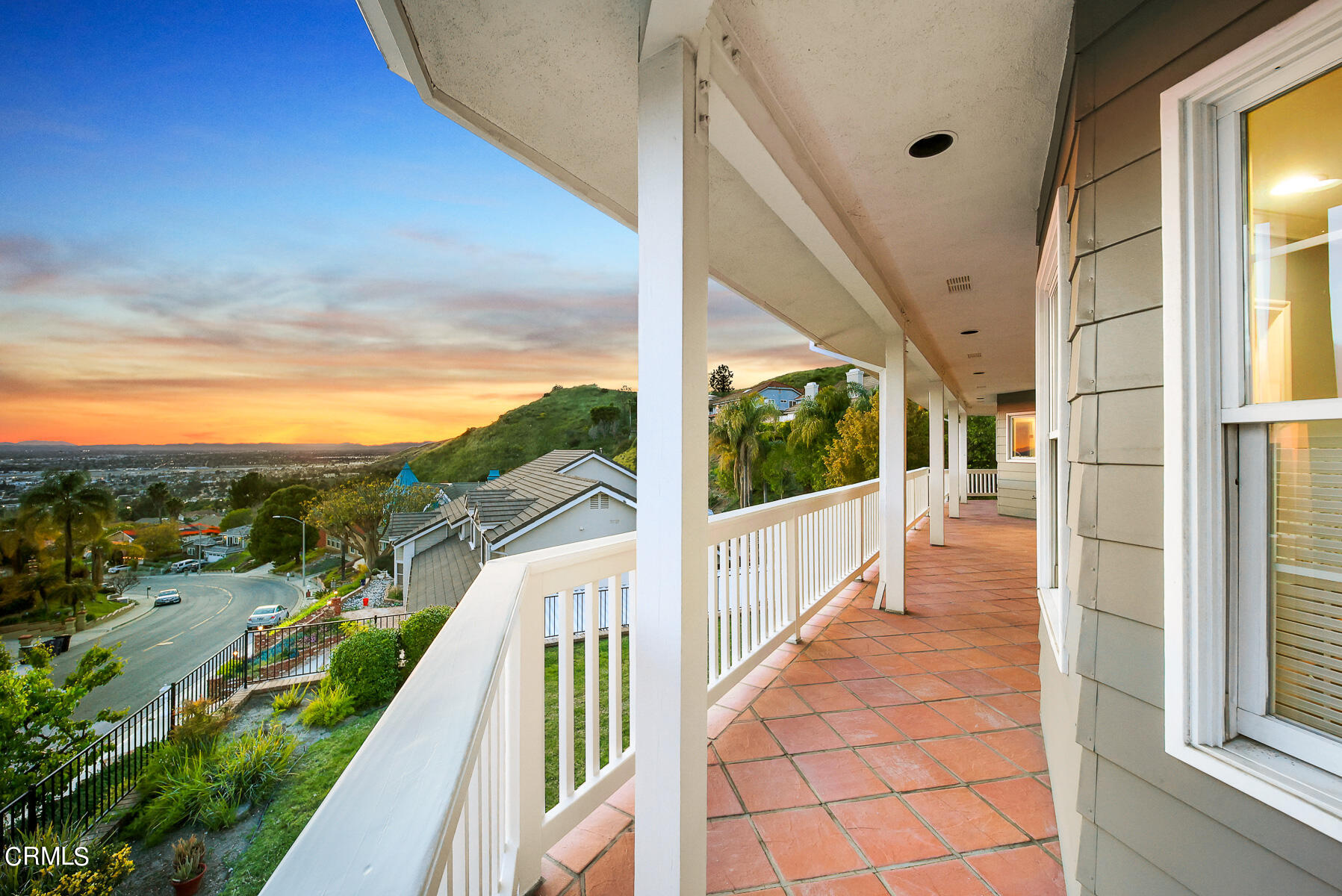 3337 Haven Way Burbank, CA 91504 - Photo 23 of 63 a view of a balcony with couches and wooden floor
