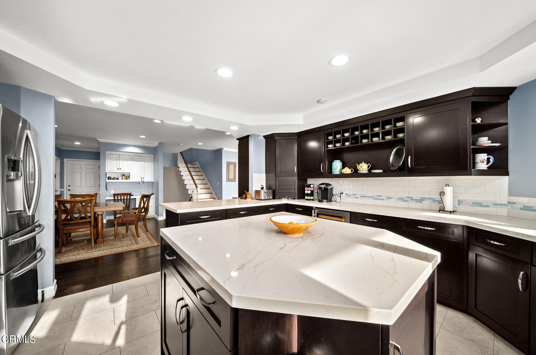 3337 Haven Way Burbank, CA 91504 - Photo 33 of 63 a kitchen with a sink a counter top space and living room view