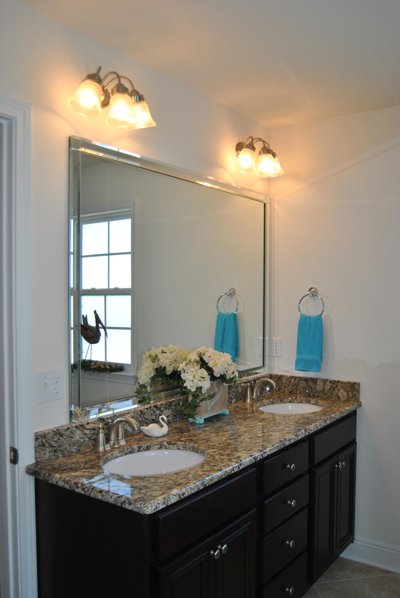 41 Topside Drive Inlet Beach, FL 32461 - Photo 11 of 42 a bathroom with a granite countertop sink and a mirror