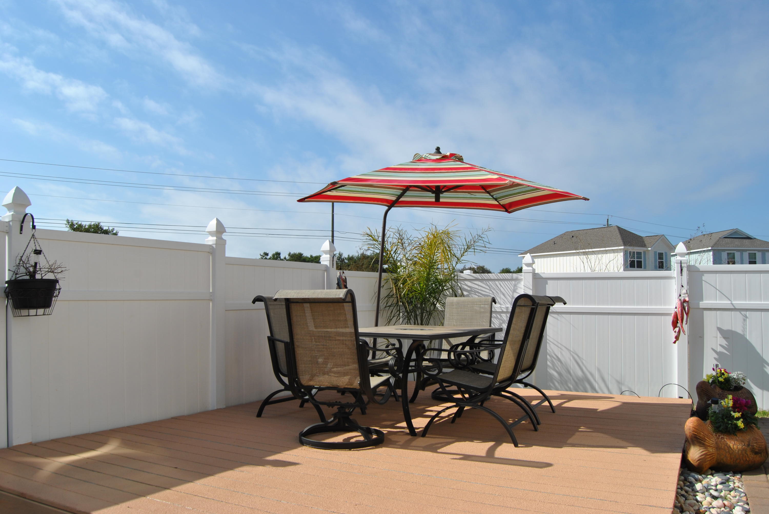 41 Topside Drive Inlet Beach, FL 32461 - Photo 15 of 42 a view of backyard with seating space and wooden floor