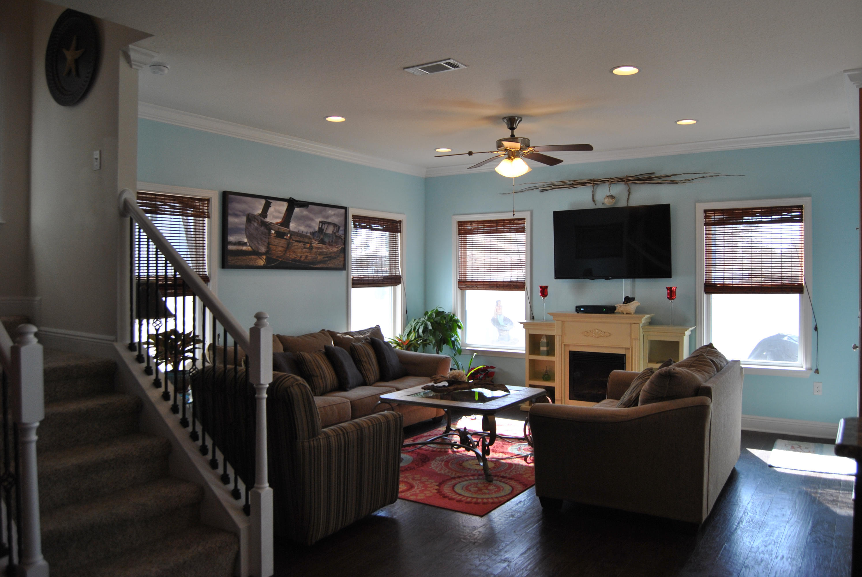 41 Topside Drive Inlet Beach, FL 32461 - Photo 27 of 42 a living room with furniture flat screen tv and a fireplace