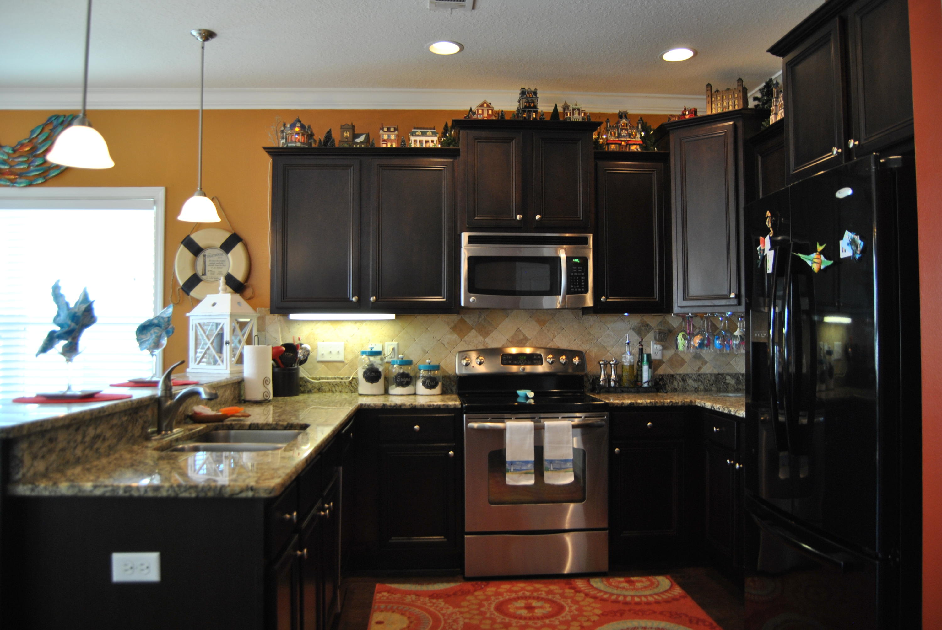 41 Topside Drive Inlet Beach, FL 32461 - Photo 6 of 42 a kitchen with a sink stove and refrigerator