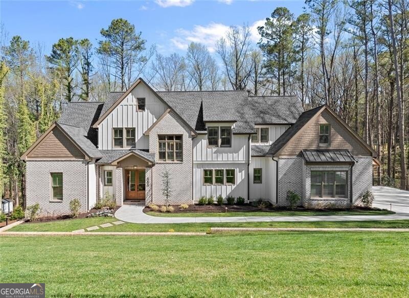 660 Colston Road Marietta, GA 30064 - Photo 1 of 1 Stunning residence featuring contemporary design, spacious layout, and scenic wooded surroundings for ultimate privacy.