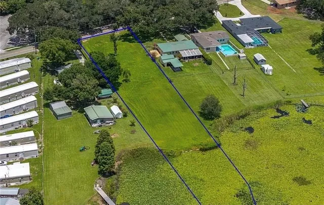 an aerial view of a residential houses