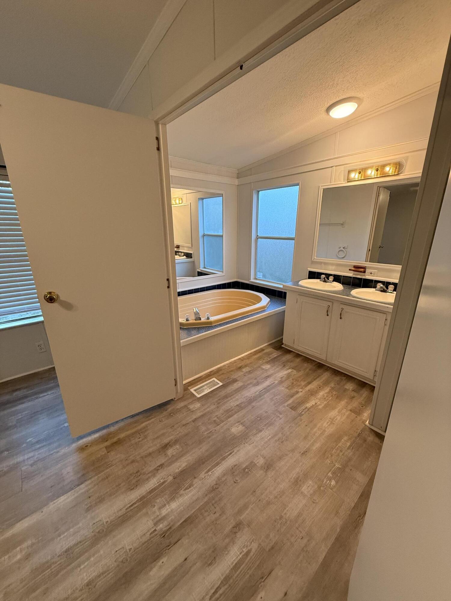 300 Ridgewood Avenue Mary Esther, FL 32569 - Photo 13 of 15 a view of a kitchen with a sink and dishwasher
