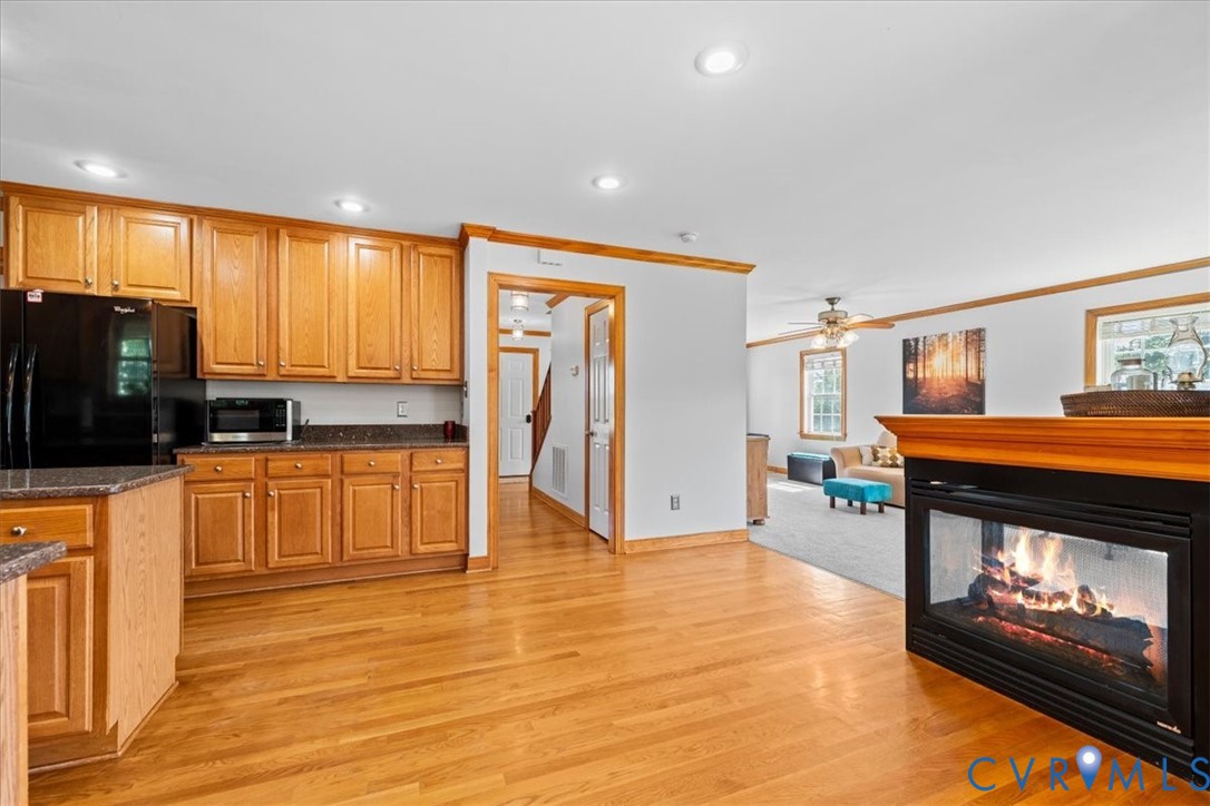 3137 Trenholm Road Powhatan, VA 23139 - Photo 20 of 72 Kitchen featuring wood cabinetry, a center island