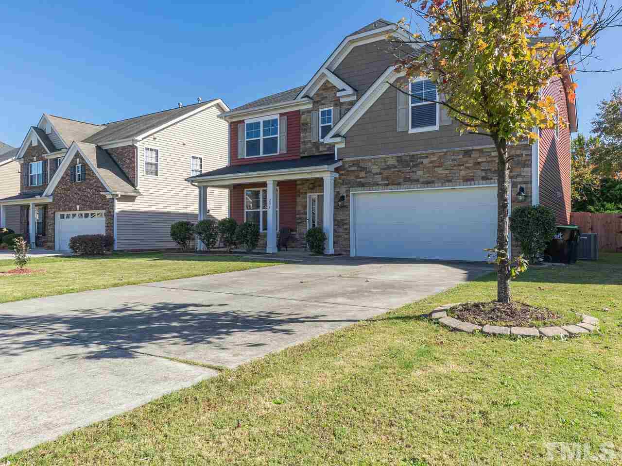 204 Hope Valley Road Knightdale, NC 27545 - Photo 2 of 30 a front view of a house with a yard