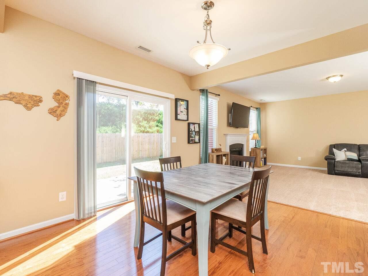 204 Hope Valley Road Knightdale, NC 27545 - Photo 11 of 30 a view of a dining room with furniture window and wooden floor