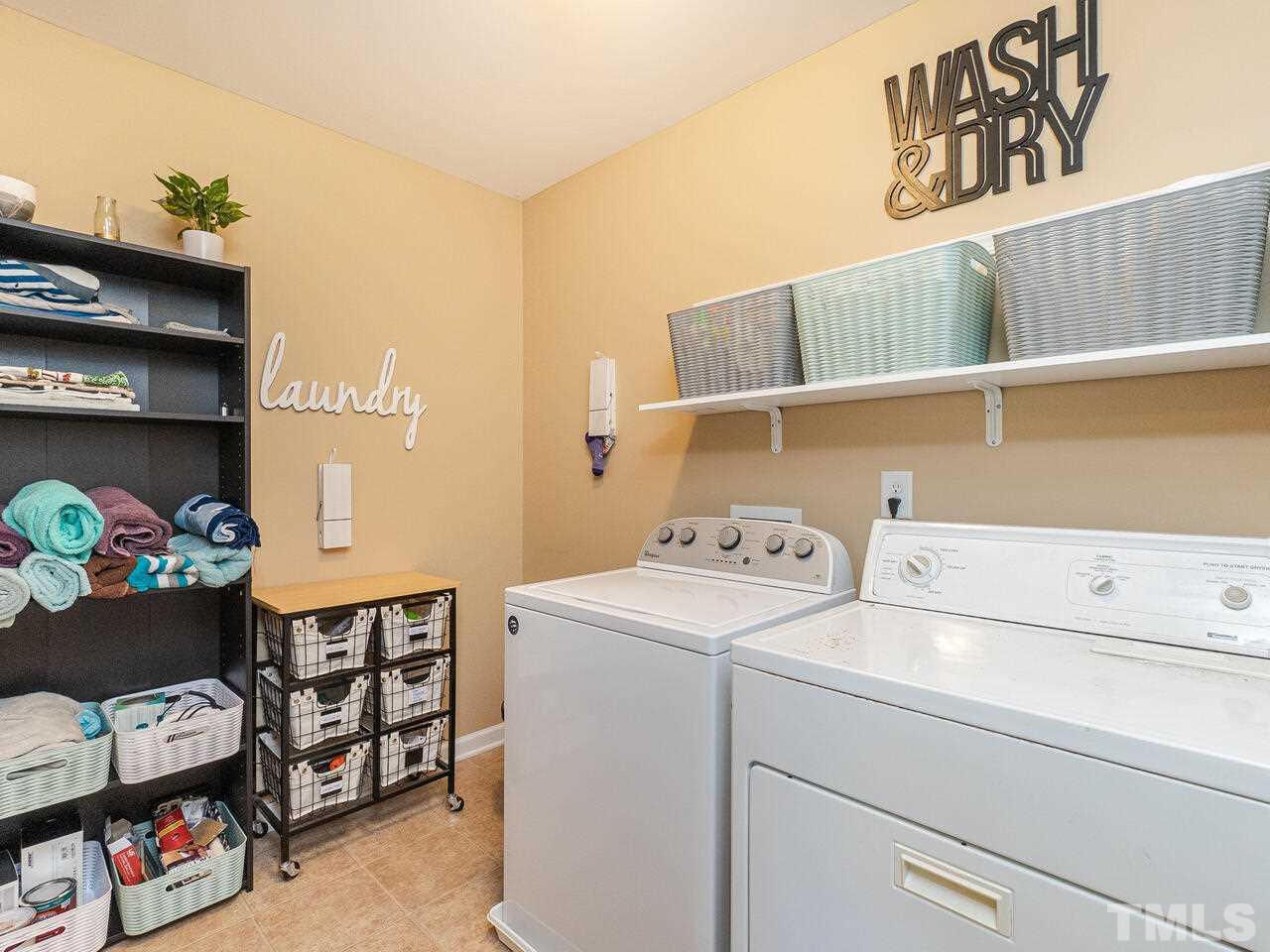 204 Hope Valley Road Knightdale, NC 27545 - Photo 14 of 30 a utility room with dryer and washer