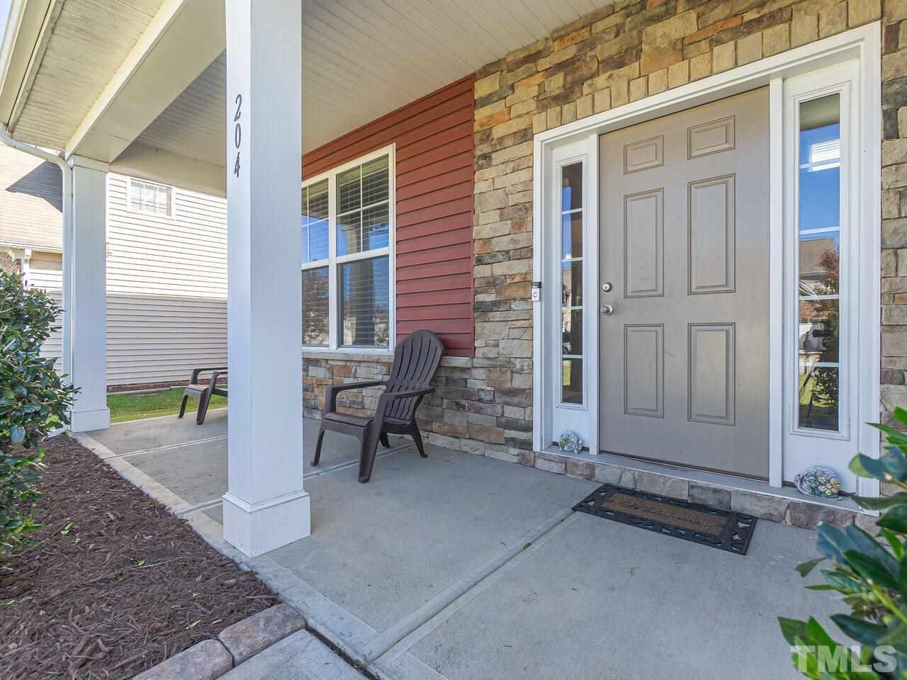 204 Hope Valley Road Knightdale, NC 27545 - Photo 3 of 30 a view of an outdoor space with porch