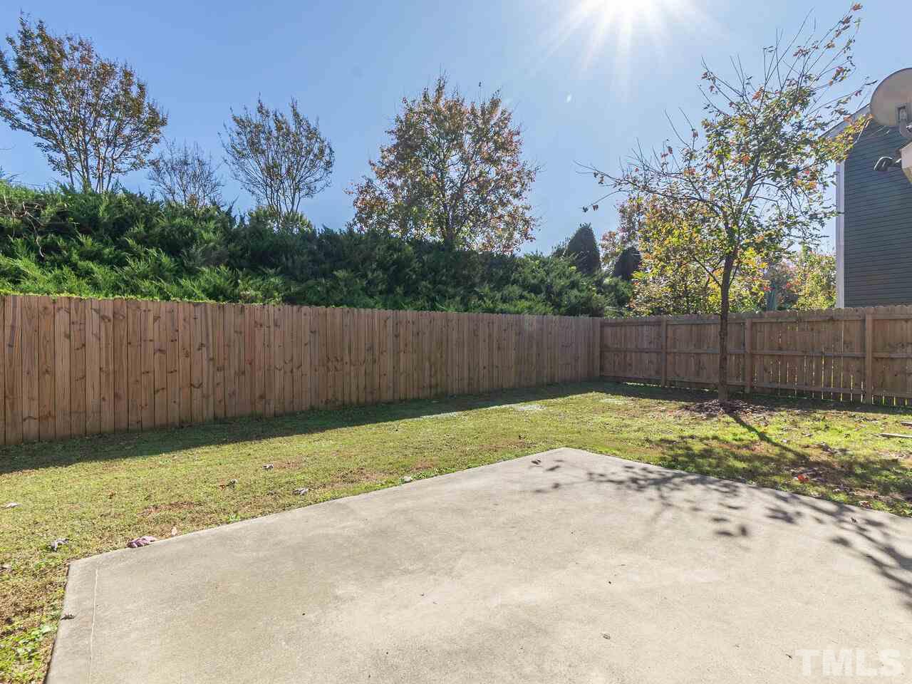 204 Hope Valley Road Knightdale, NC 27545 - Photo 27 of 30 a view of backyard with wooden fence
