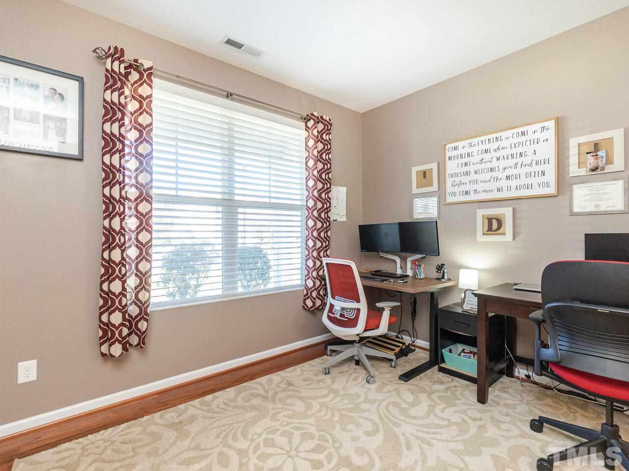 204 Hope Valley Road Knightdale, NC 27545 - Photo 5 of 30 a workspace with a window