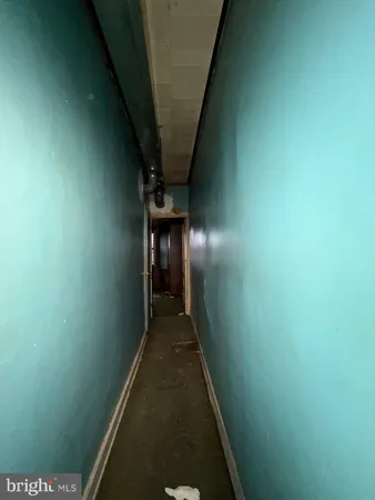 a view of hallway with shower