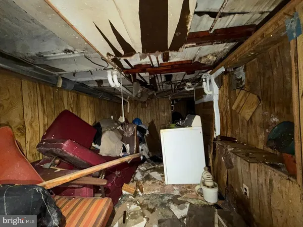 a bathroom with a toilet a sink and the shower