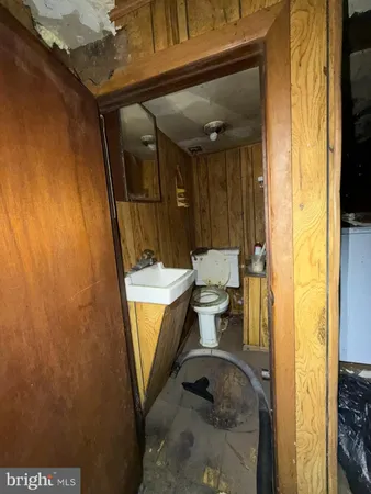 a room with lots of green space and windows