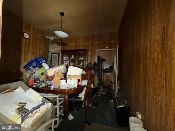a kitchen with table and chairs