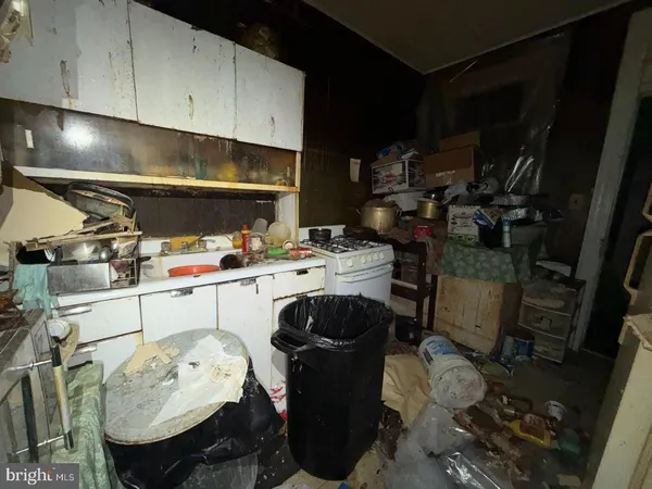 a storage room with washer and dryer