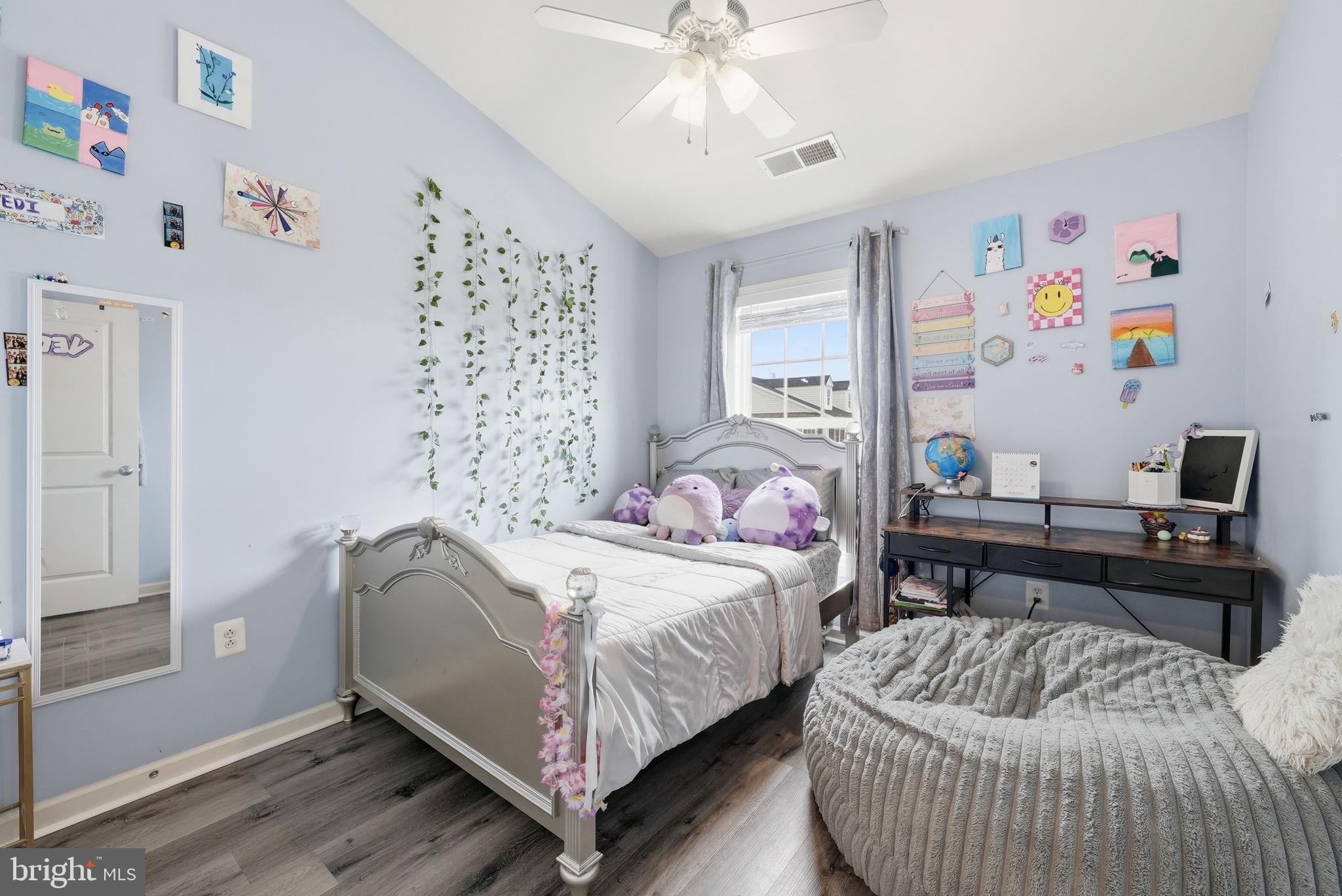 25077 Prairie Fire Square Aldie, VA 20105 - Photo 12 of 15 Charming pastel bedroom with playful decor.