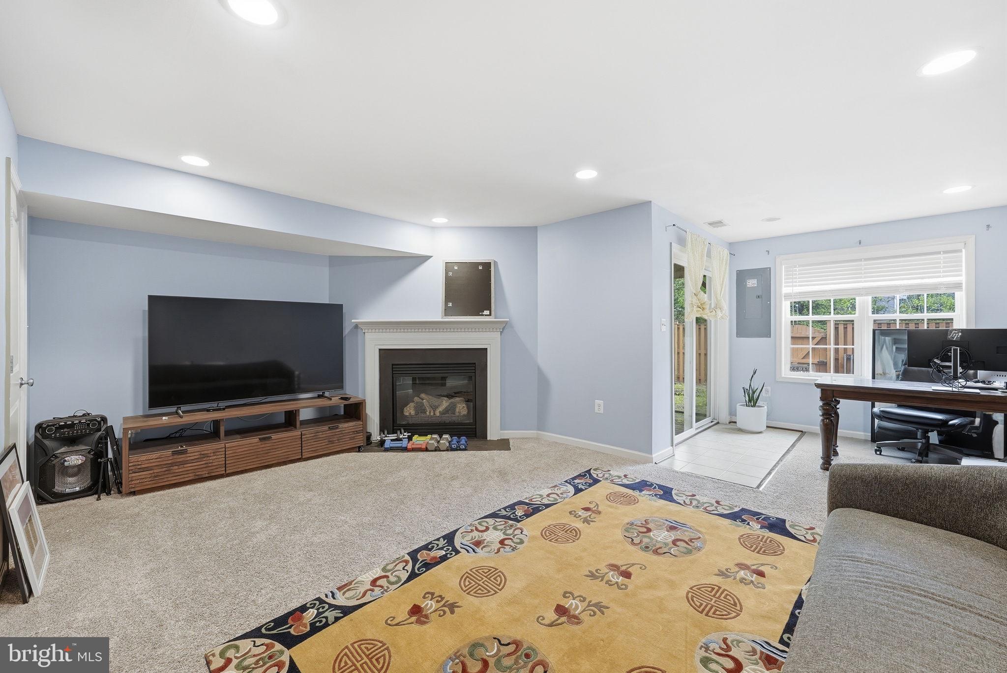 25077 Prairie Fire Square Aldie, VA 20105 - Photo 14 of 15 Cozy living space with modern charm.