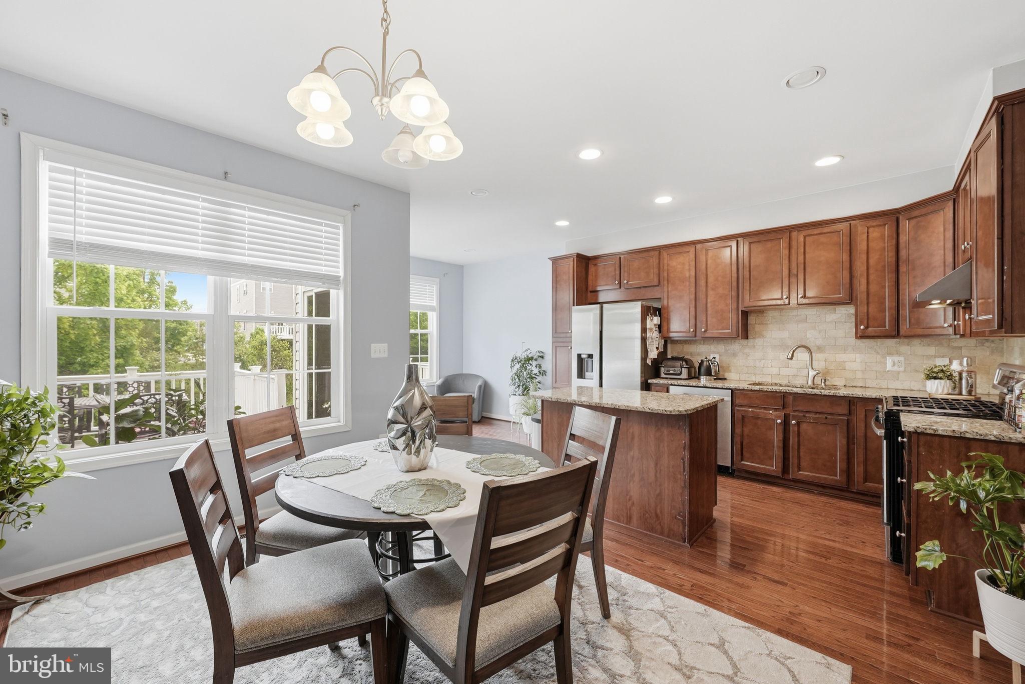25077 Prairie Fire Square Aldie, VA 20105 - Photo 5 of 15 Bright and inviting modern kitchen.