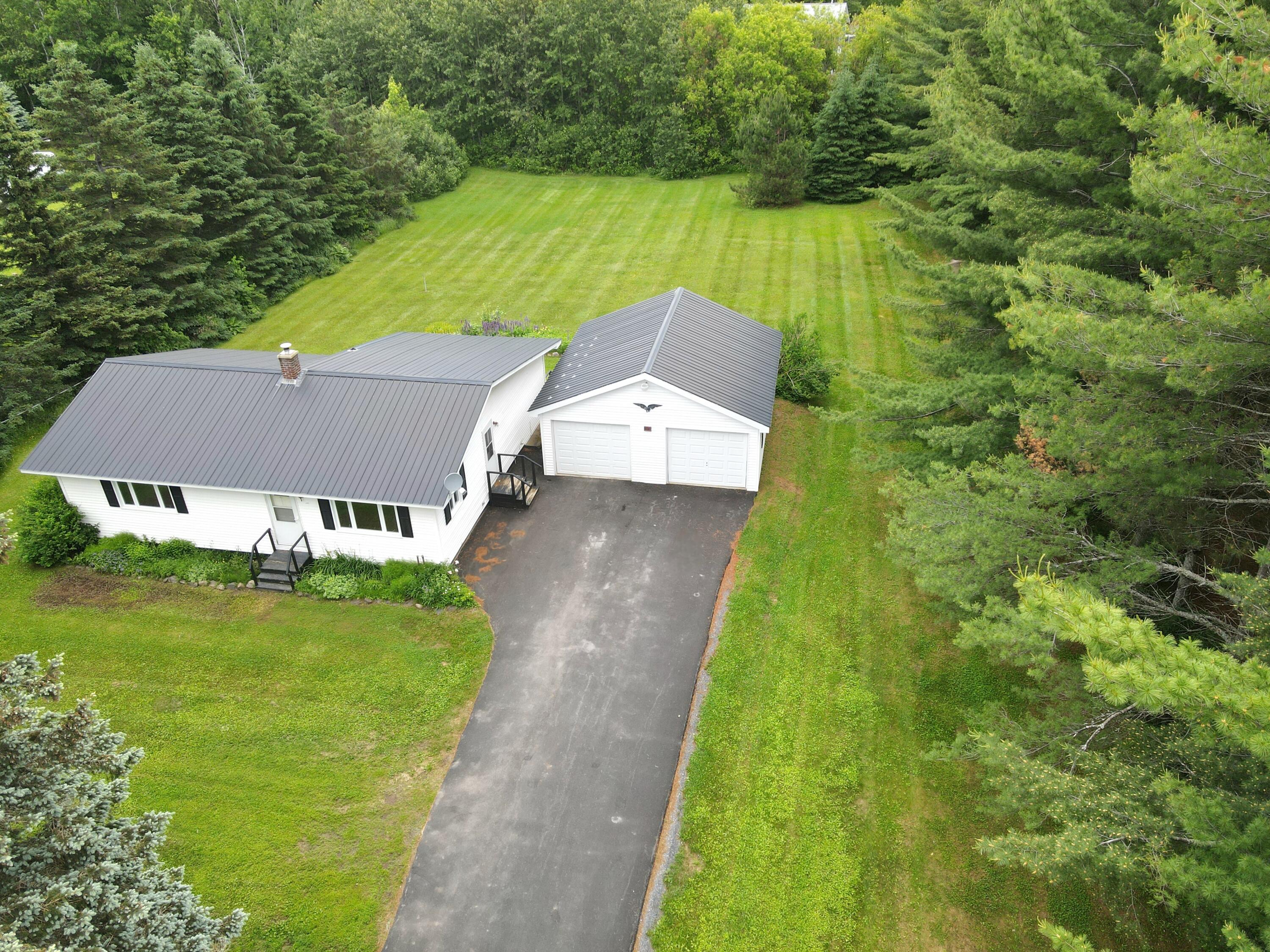 55 Hughes Road Mapleton, ME 04757 - Photo 4 of 55 dji_fly_20240613_112132_756_171829220115