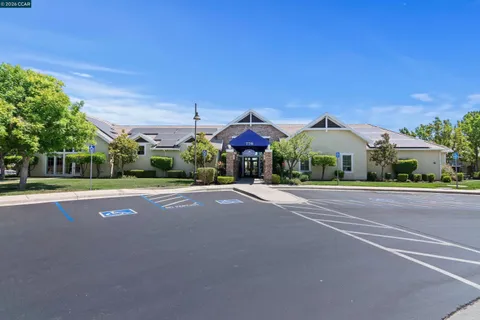 a front view of a house with a porch