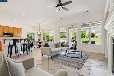 a kitchen with a stove sink and microwave