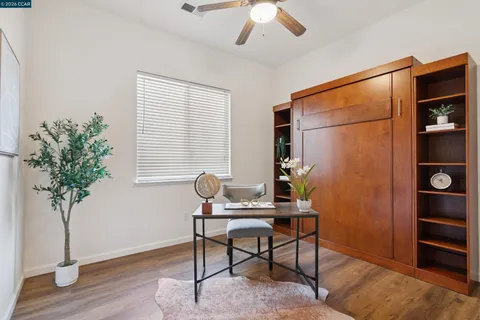 a bedroom with bed and a window