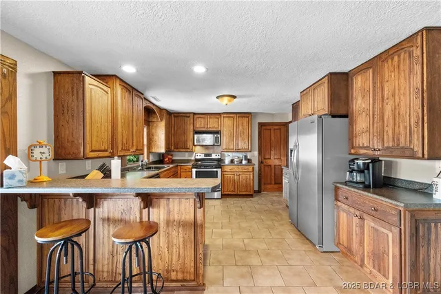 $699,900 | 261 Shell Bay Circle, Linn Creek, MO 65052