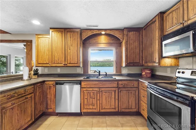 $699,900 | 261 Shell Bay Circle, Linn Creek, MO 65052