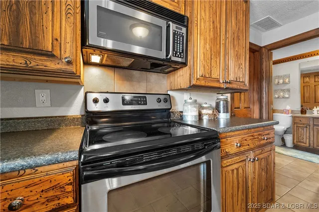 $699,900 | 261 Shell Bay Circle, Linn Creek, MO 65052