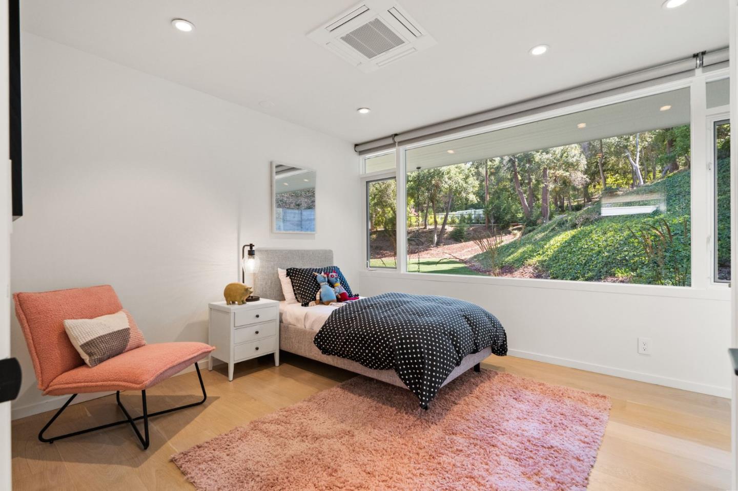 161 Eleanor Drive Woodside, CA 94062 - Photo 23 of 57 a bed room with a bed and a chair