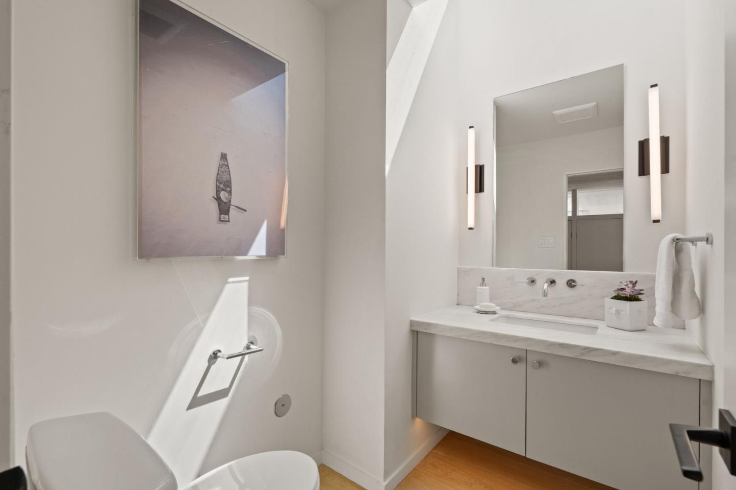 161 Eleanor Drive Woodside, CA 94062 - Photo 30 of 57 a bathroom with a sink mirror and toilet